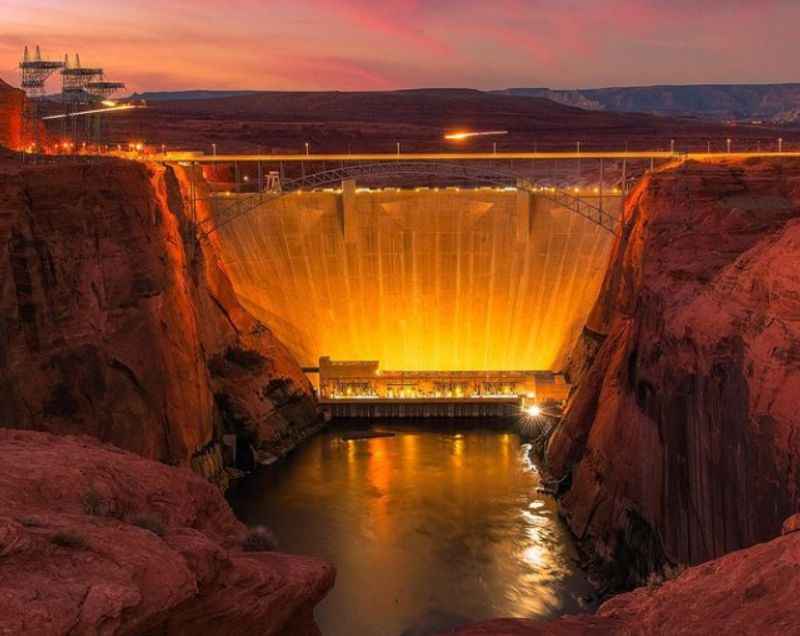 golden colored dam at night