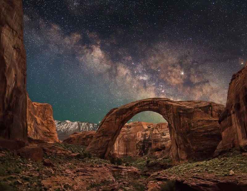 amazing night sky over arches of the rock