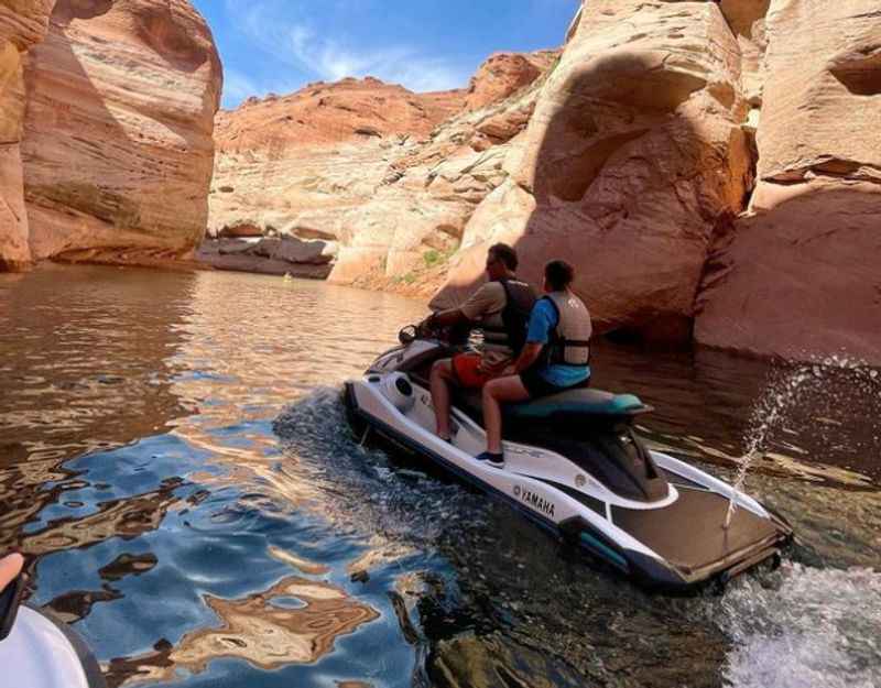 a man riding a jet in the water