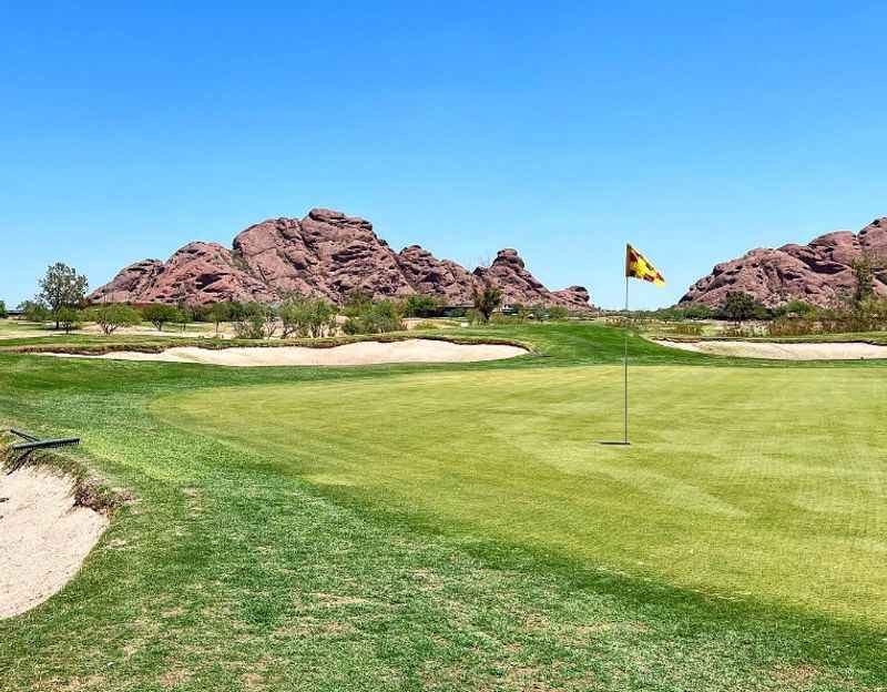 green field golf course and sand bunkers