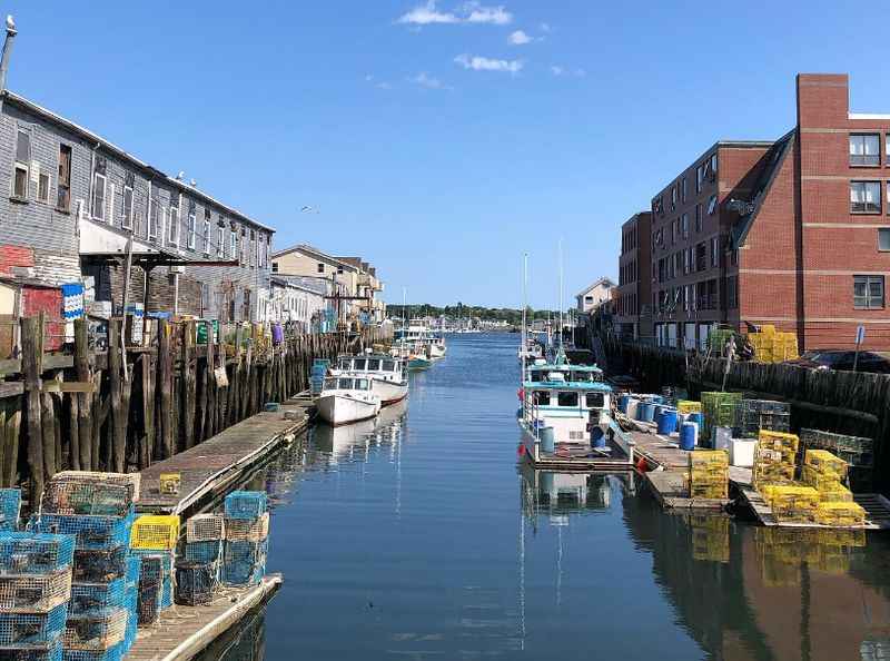 port with boats and tanks on the side