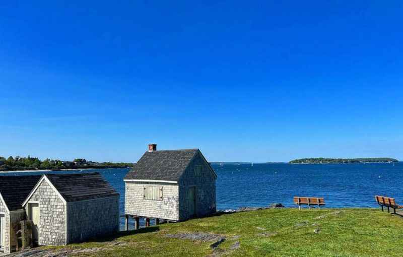 Stone made house built on the hill with overlooking water