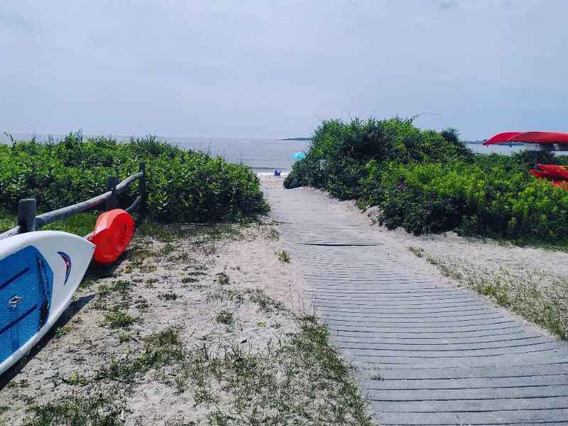 a kayak on the beach under the shady weather