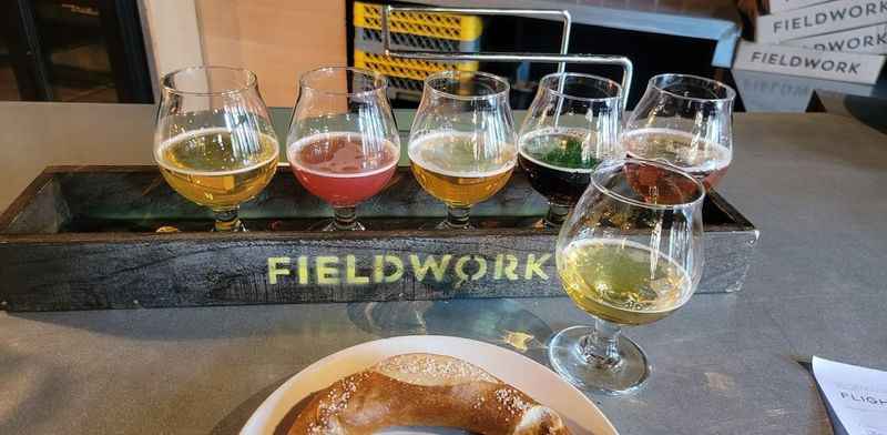 a plate of food and glasses on a table