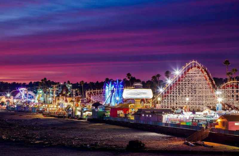 roller coaster with lights at night