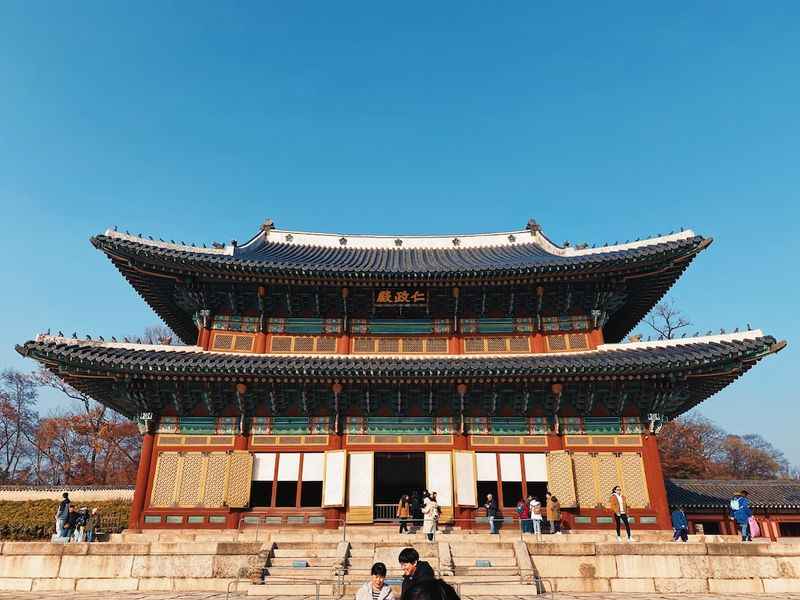 facade of korean heritage with people in front