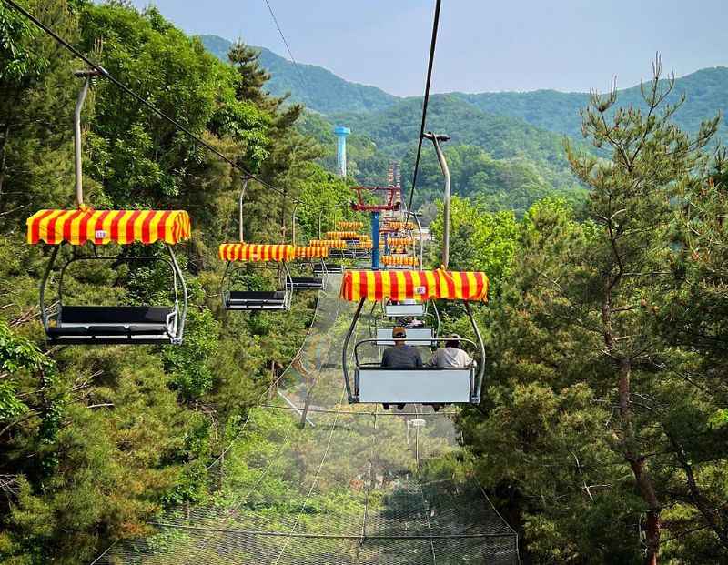 a cable car going up the mountain