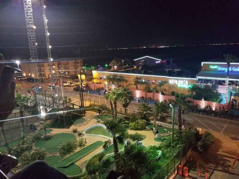 a view of the golf course at night