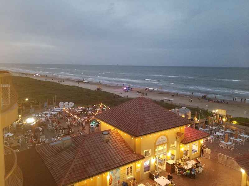 a view of the beach from a balcony