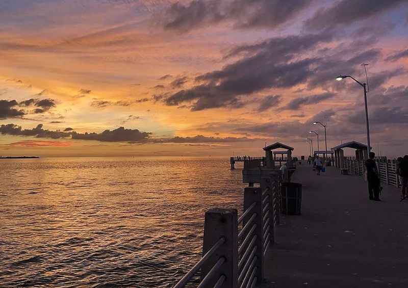 a view of sunset on the pier