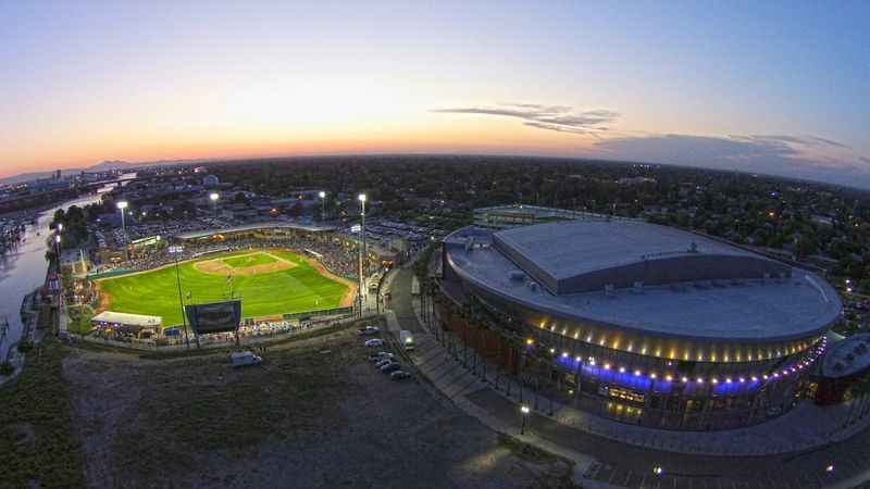 baseball stadium at dusk with view of the field