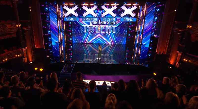 the x factor live with a girl on the stage