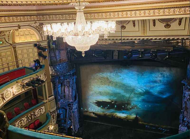 elegant chandelier above the theatre stage