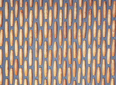 Détail d'un rideau de porte en perles de bois