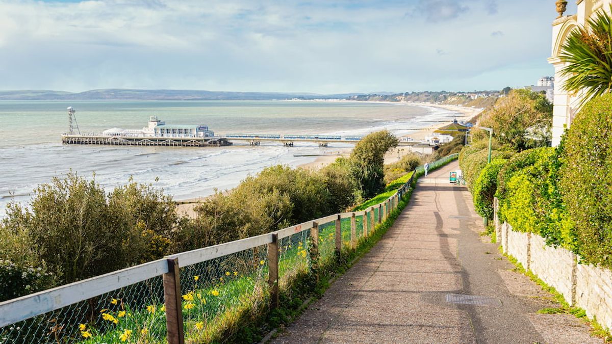 The clifftop path above Bournemouth beach looking towards the pier