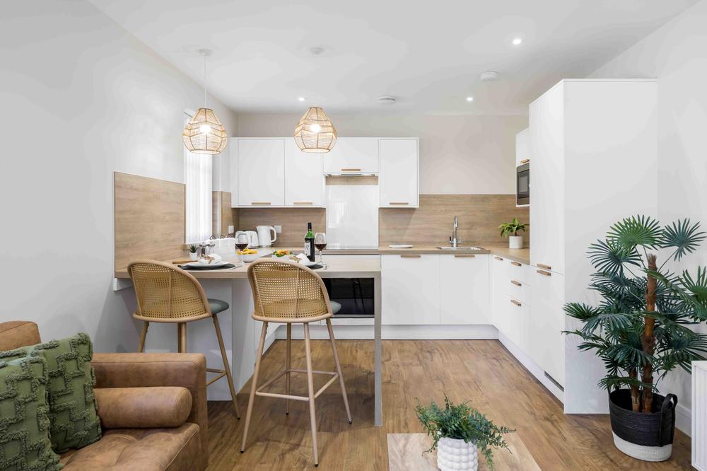 Kitchen and living space of a garden apartment at Cliff Heights