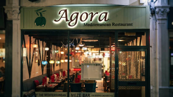 Entrance of Agora Mediterranean Restaurant with decorative lights