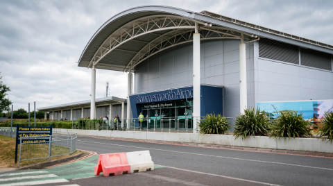 Entrance of Bournemouth Airport featuring a large canopy