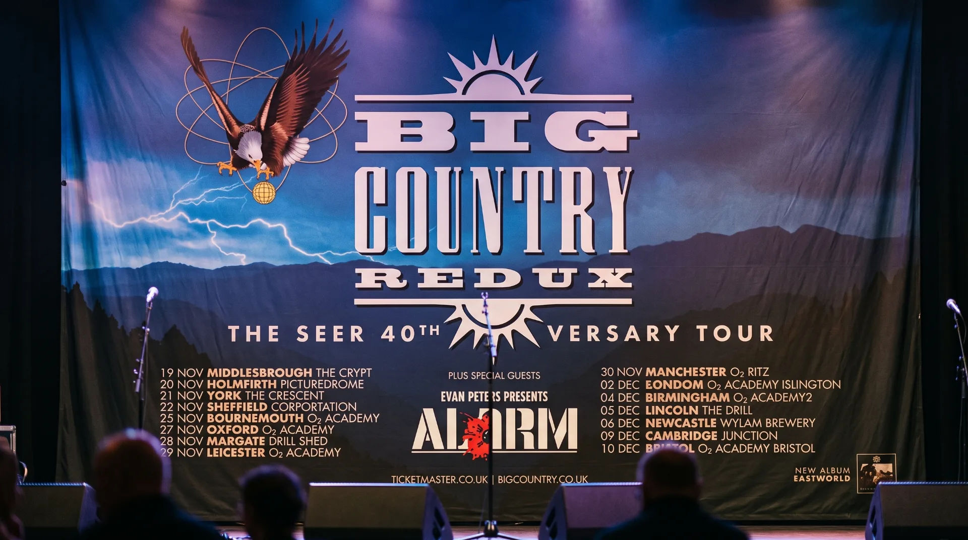 Stage backdrop for Big Country's performance, featuring an eagle and tour details