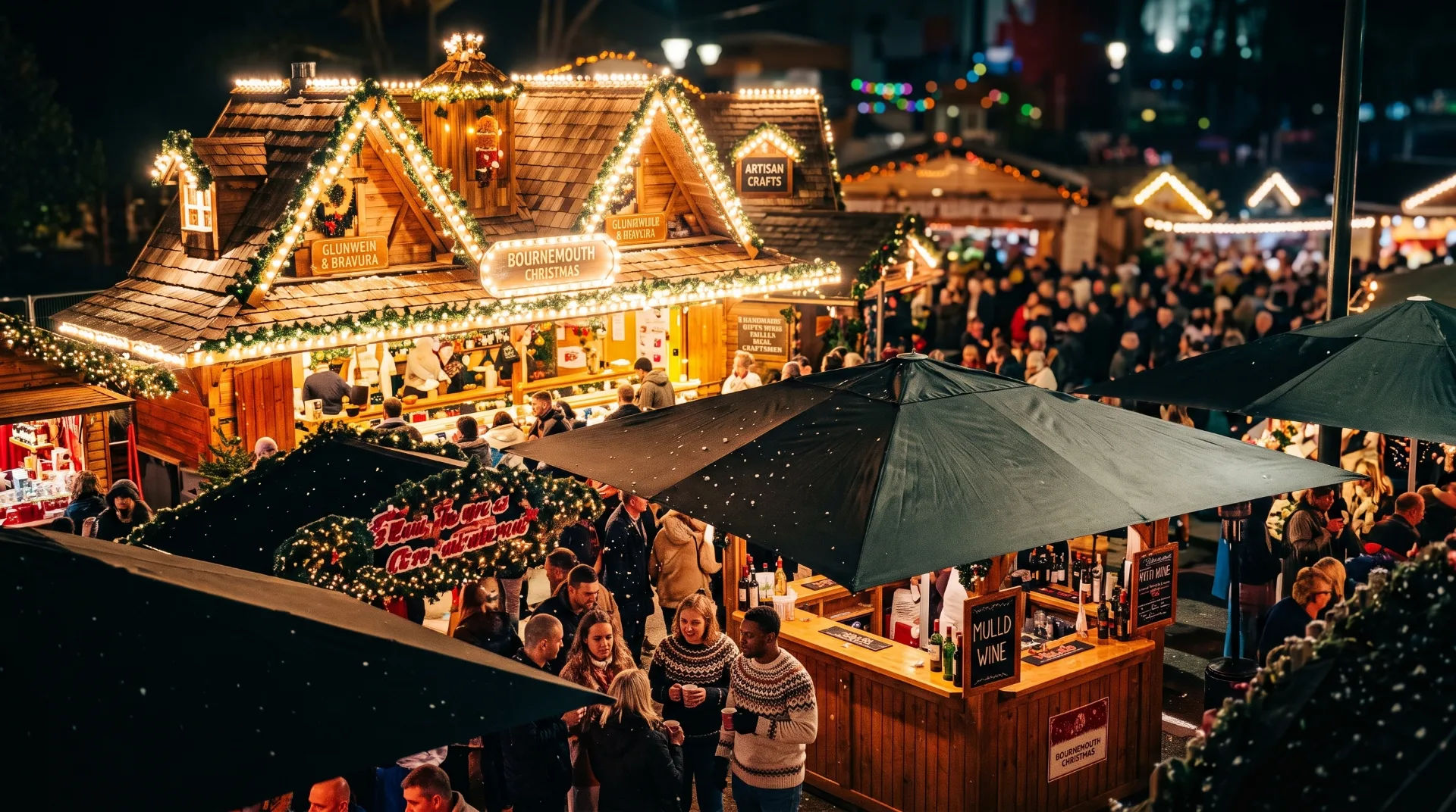 Crowd at a festive Christmas market with wooden stalls and umbrellas, decorated with lights and greenery.