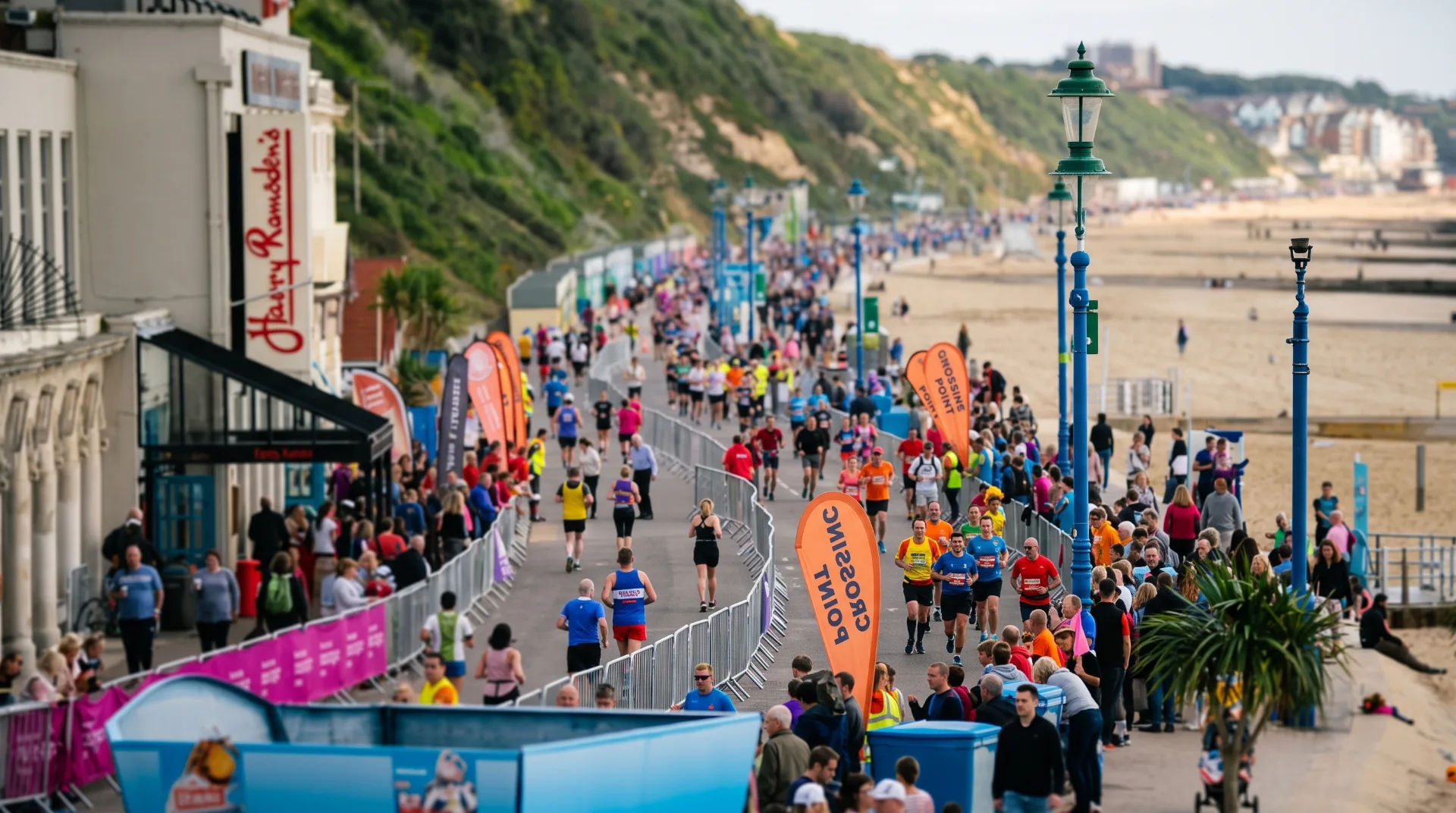 Runners participating in the Bournemouth Marathon Festival along the seafront promenade.