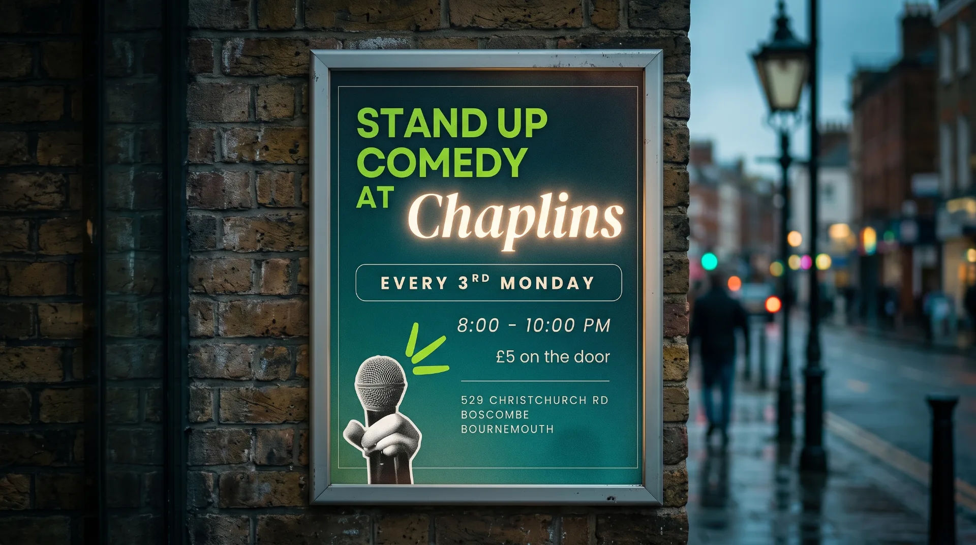 A sign outside Chaplins Bar advertising stand-up comedy events, featuring a microphone illustration and event details.