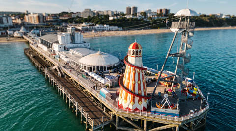 Bournemouth Pier featuring a large amusement ride and sea