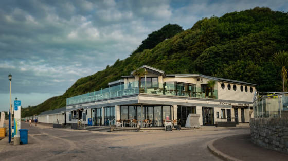 Modern beach office and public toilets with a terrace at Bournemouth