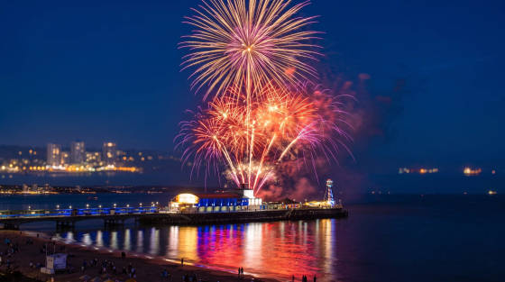 Colourful fireworks bursting above Bournemouth Pier