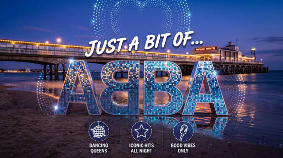 Large ABBA letters illuminated on the beach near Bournemouth Pier