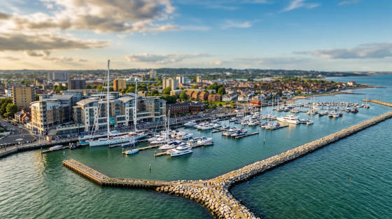 Aerial view of Bournemouth Marina with yachts and buildings