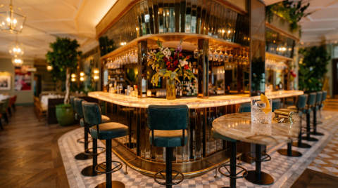 Elegant bar interior with marble counter and stylish seating