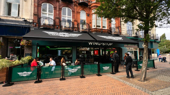 Wing Stop restaurant with outdoor seating in Bournemouth