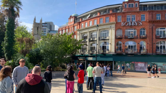Crowd of people in front of Bobby's restaurant in Bournemouth