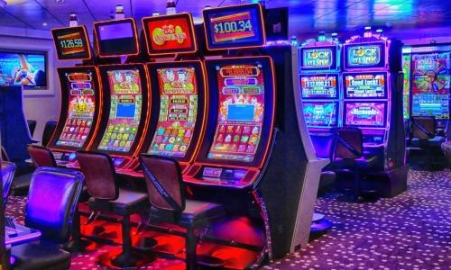 Poker slot machines in a gaming environment