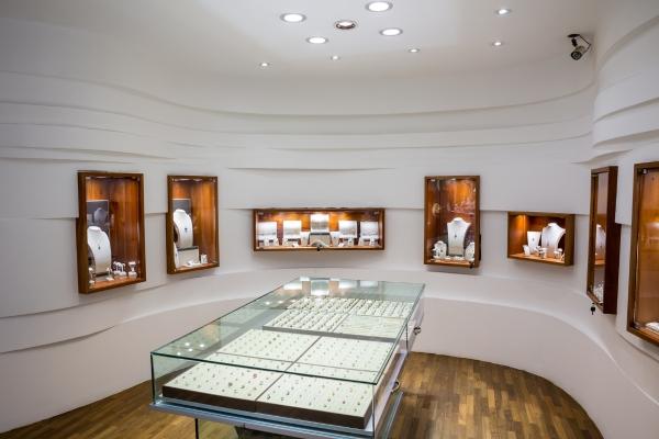 Jewelry retail showroom with illuminated display cases