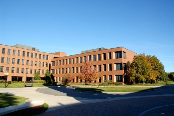 School campus with a main entrance and landscaped grounds