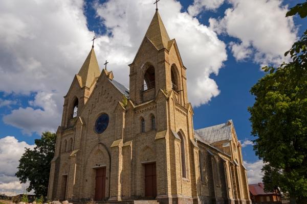 Church building with a prominent entrance and surrounding grounds