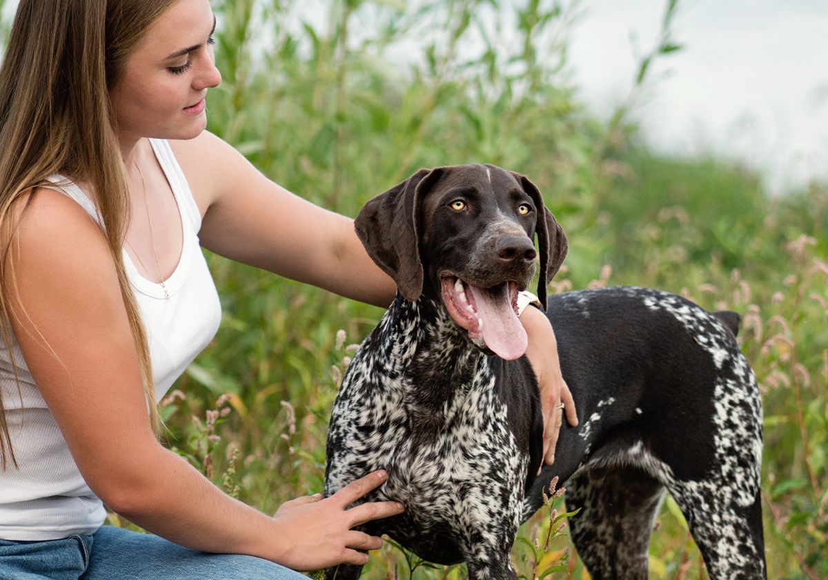 Chien avec sa maîtresse