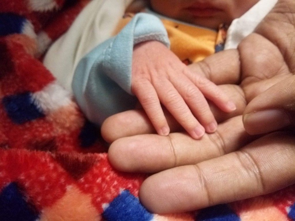 Picture of hand of our little bundle of joy :)