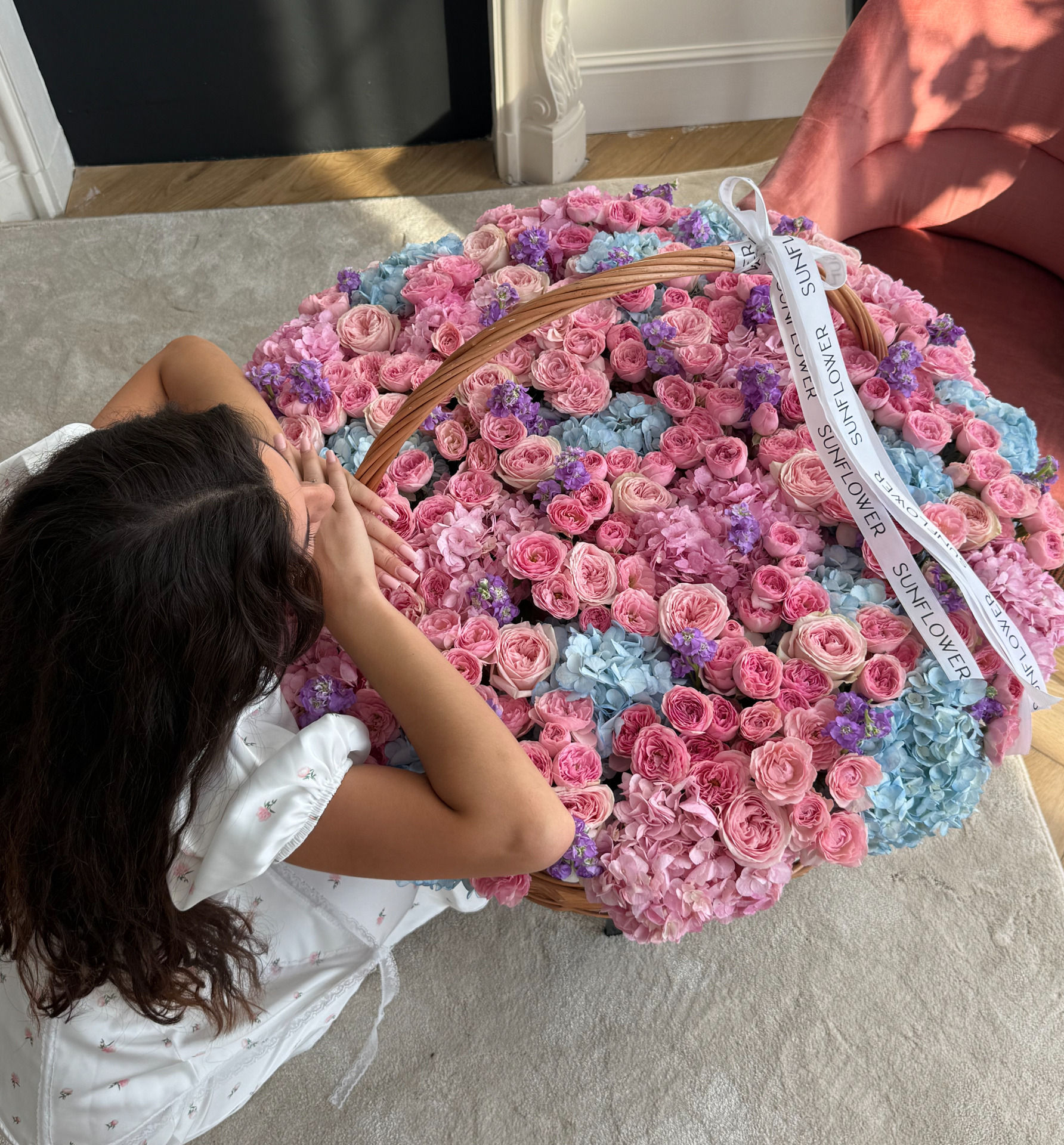 Arrangement with hydrangeas, bush roses and other flowers