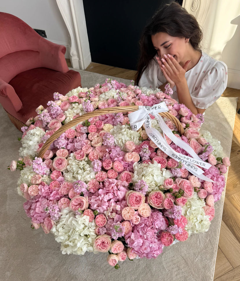Delicate basket with pink rose and mattiola