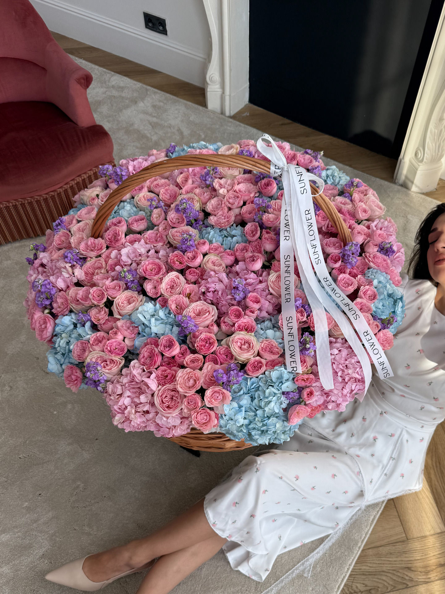 Arrangement with hydrangeas, bush roses and other flowers
