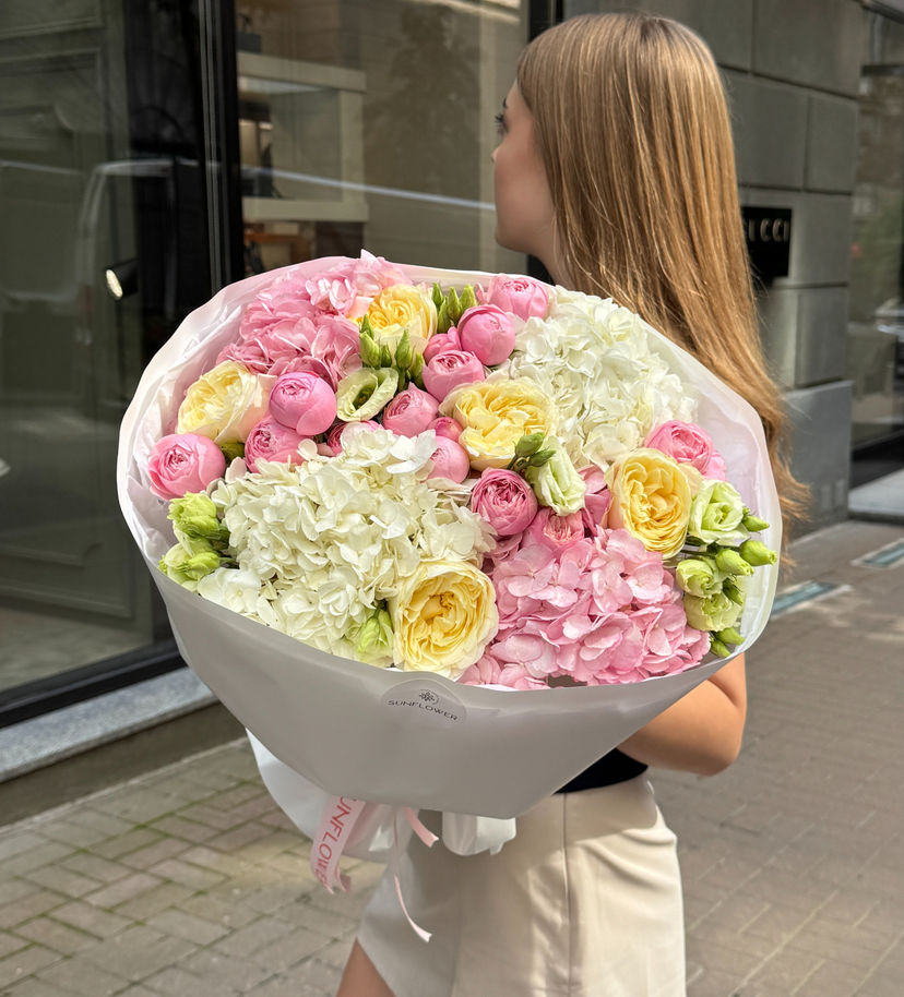 Bouquet of white and pink hydrangeas and peony roses