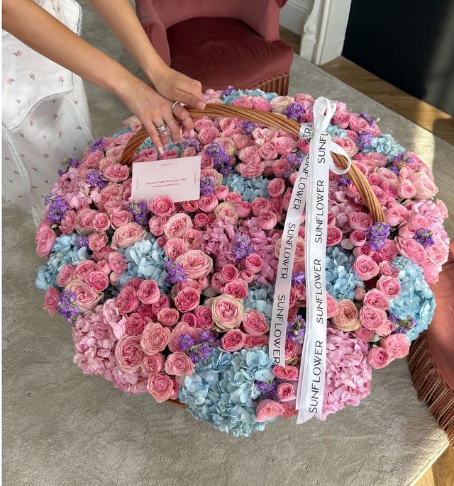 Arrangement with hydrangeas, bush roses and other flowers