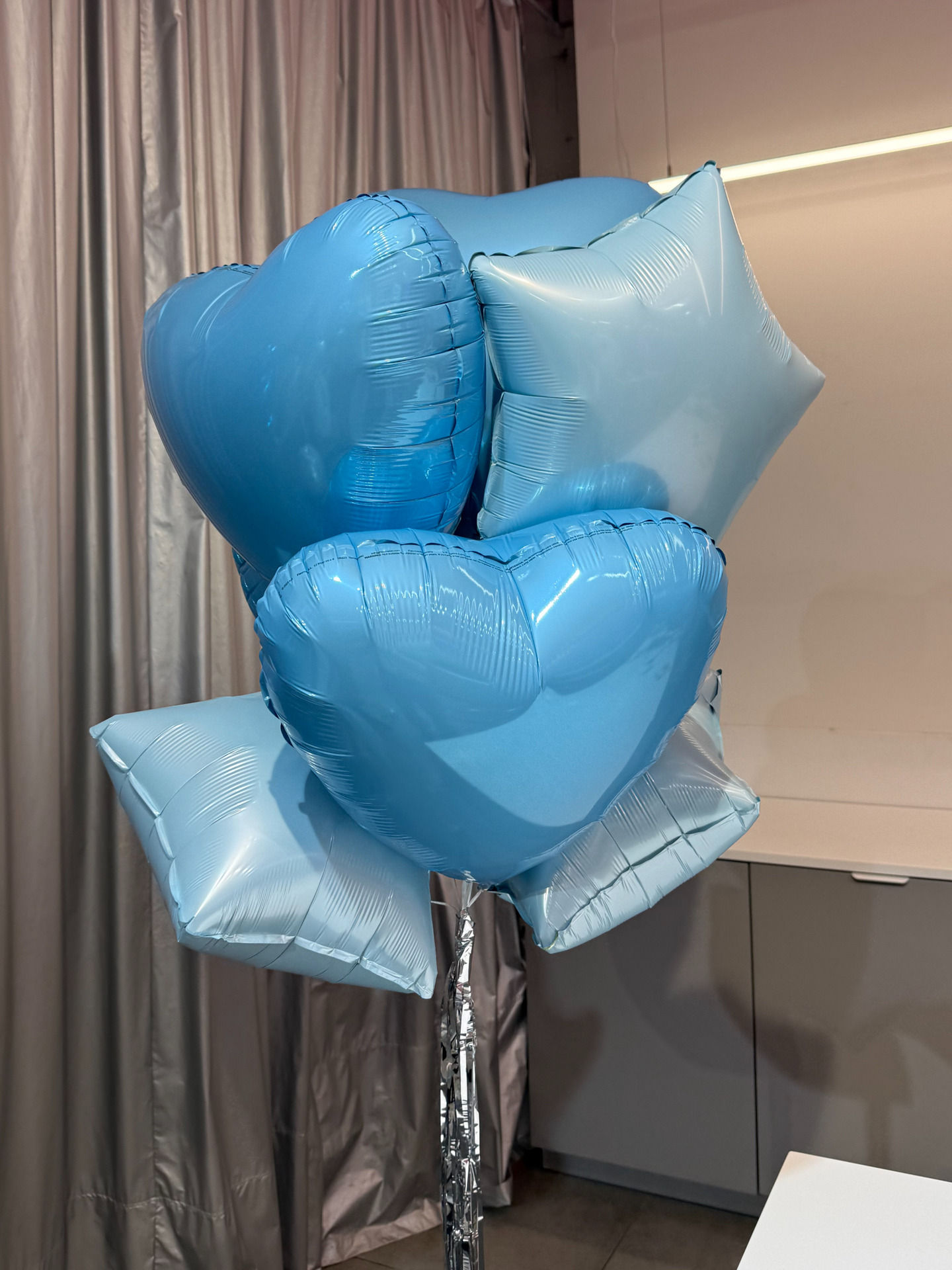 Set of foil balloons. Blue hearts and stars