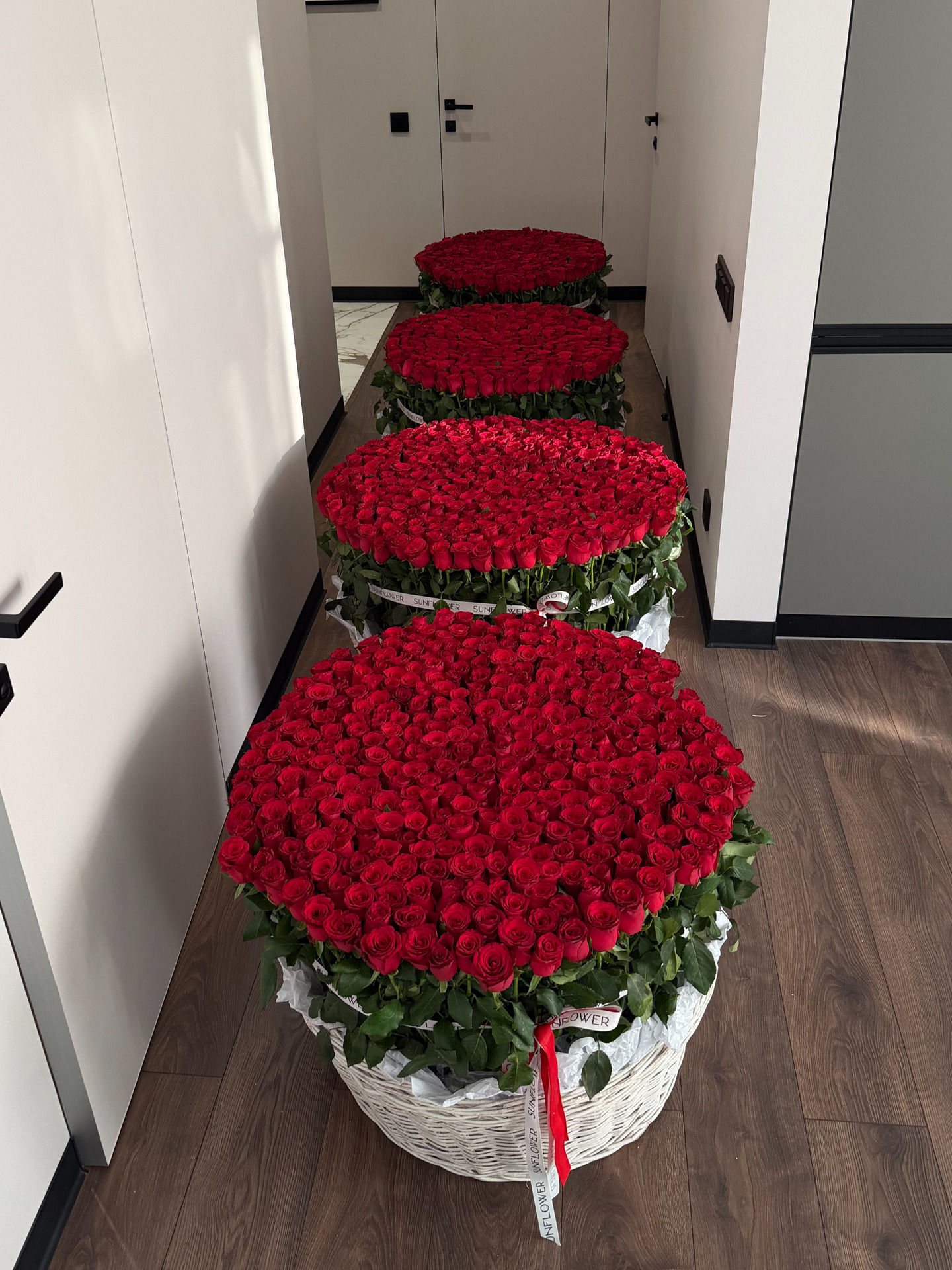 Four HL baskets of 351 roses each