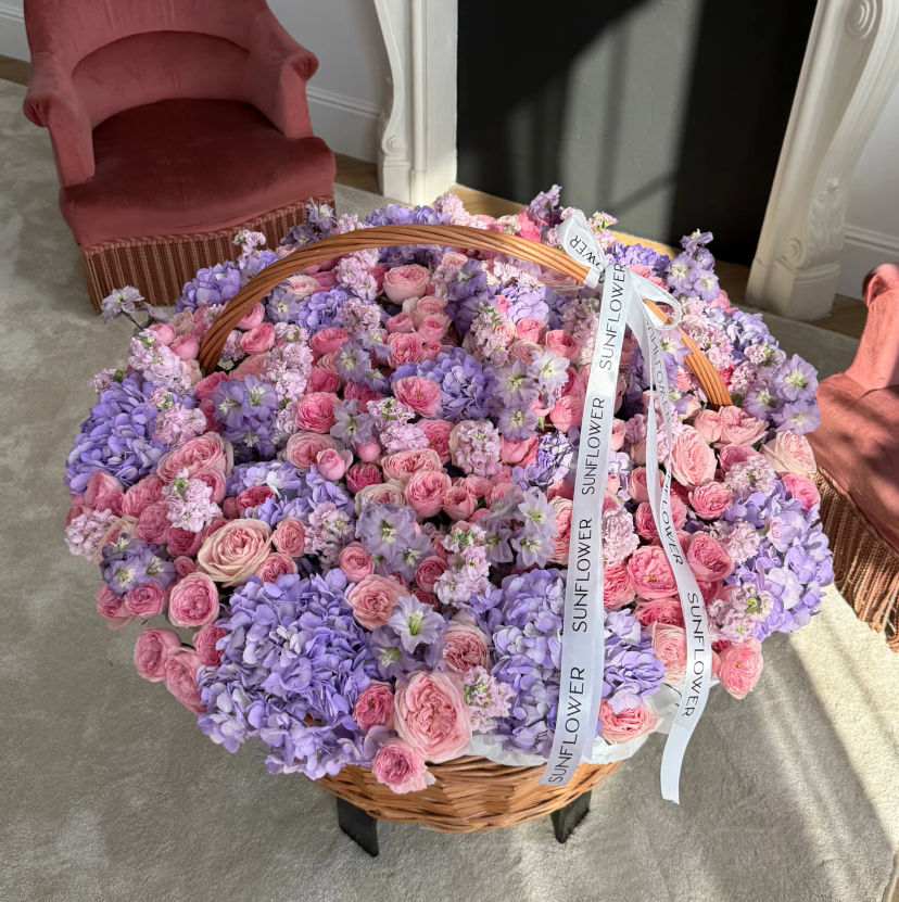 Bright pink-purple basket with delphinium