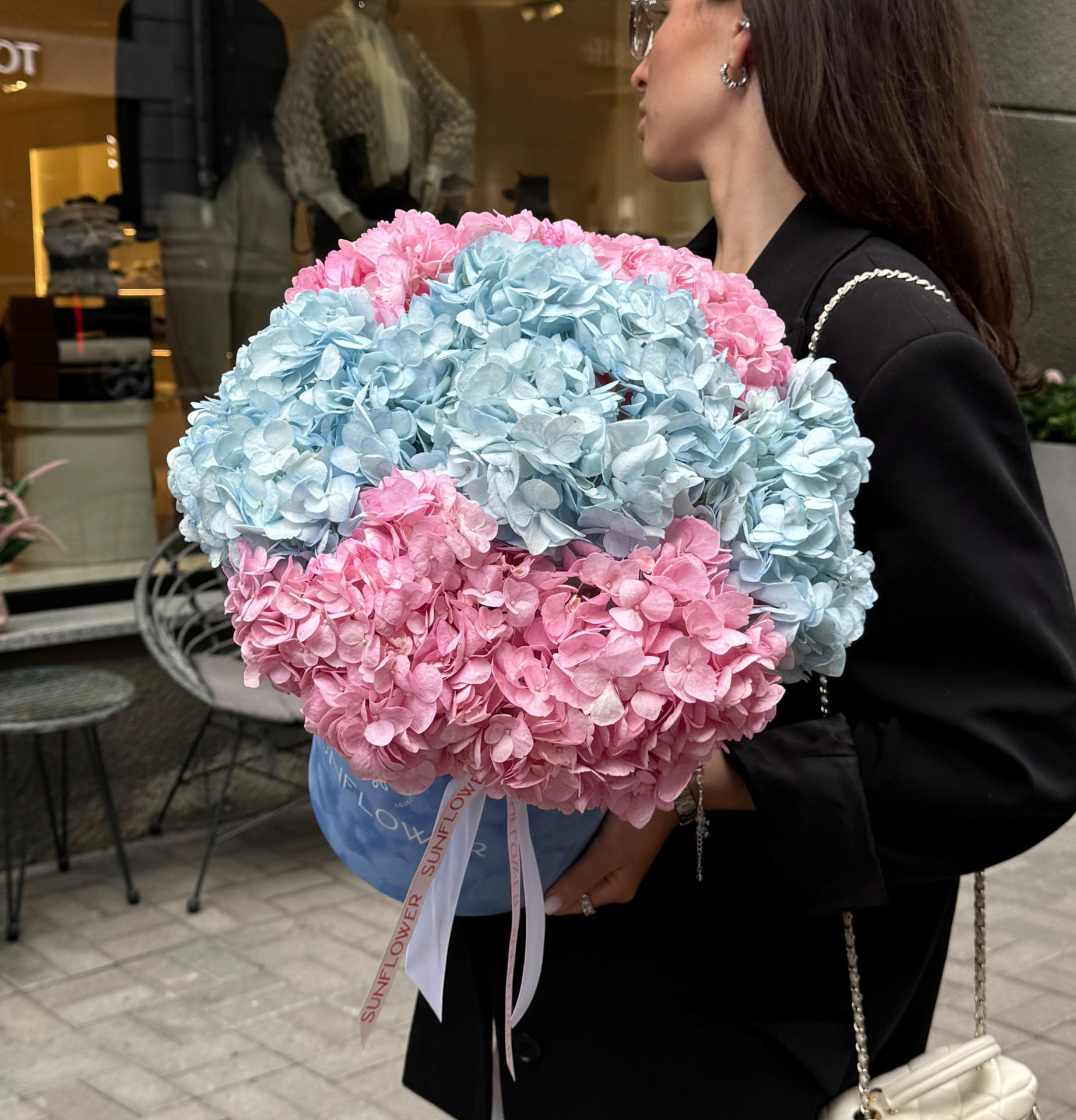 Blue-pink hydrangeas in a box