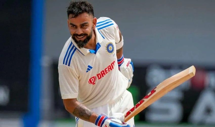 Virat Kohli waves to fans after his final Test match